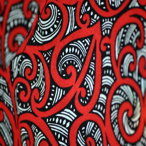 Detail of Koru pattern on retro apron.