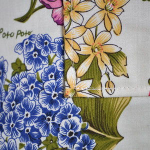Detail on handsewn retro NZ Flora apron.