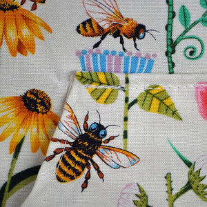 Detail on handsewn retro Bee pattern apron.