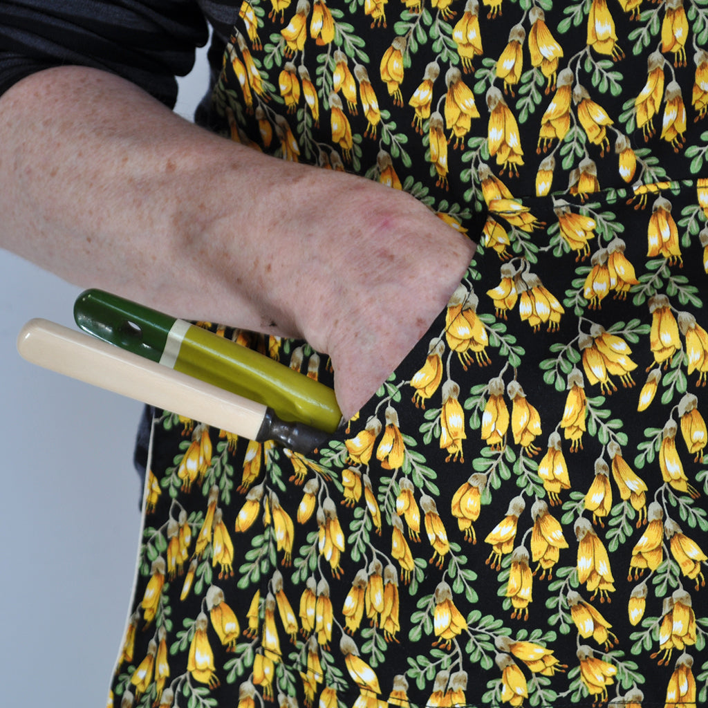Close up of pocket on Kowhai retro apron.