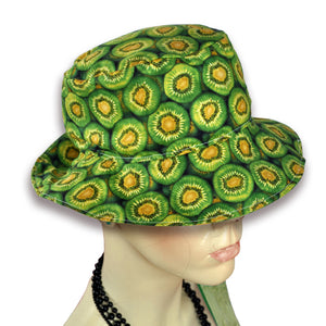 Kiwi fruit pattern on bucket hat worn by mannequin.