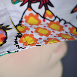 Close up of Quirky Kiwis pattern bucket hat