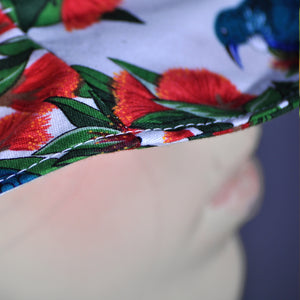Close up of Tui pattern bucket hat