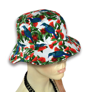 Mannequin wearing tui pattern bucket hat.